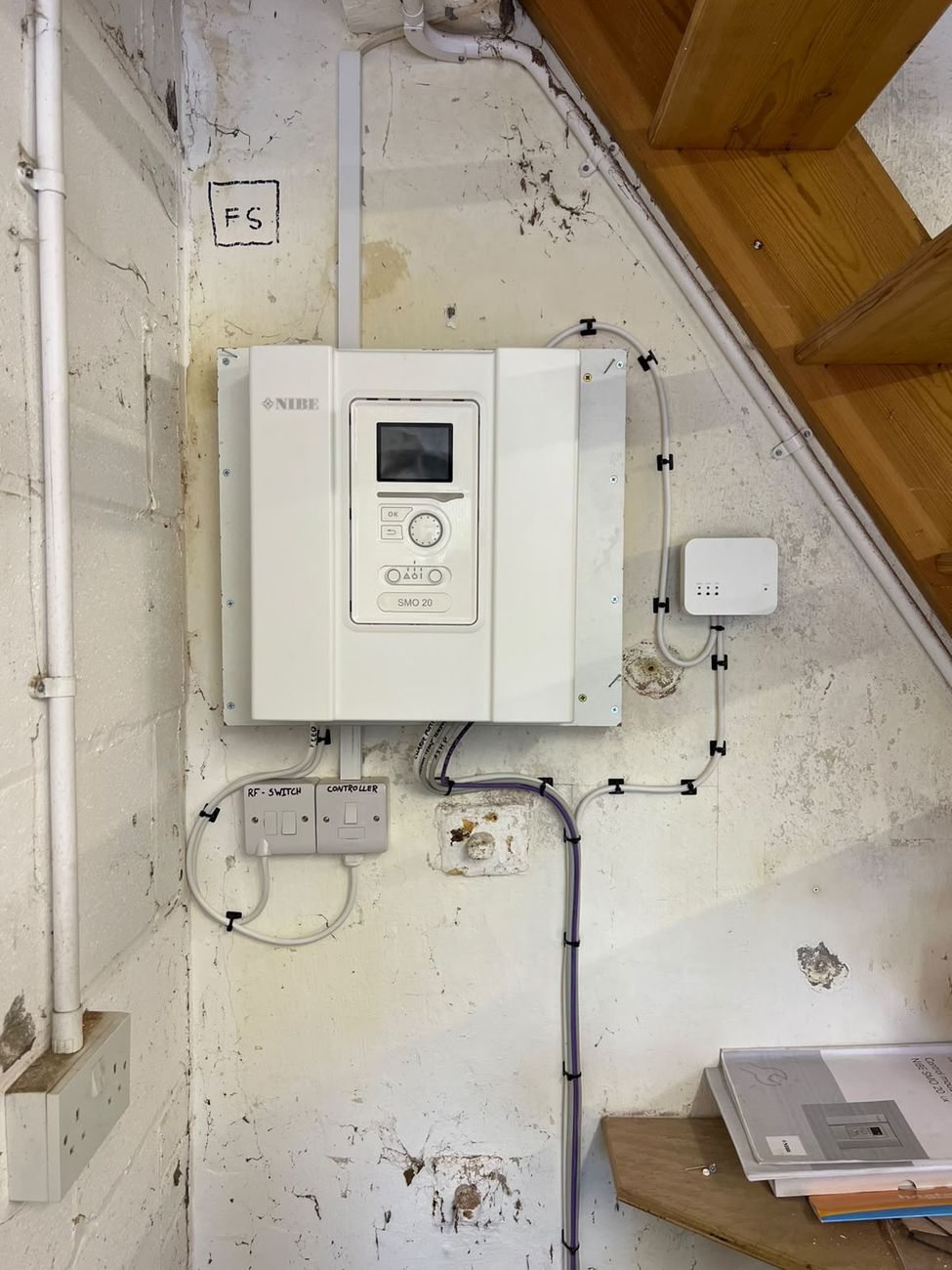 NIBE heat pump indoor controller unit wired and mounted
