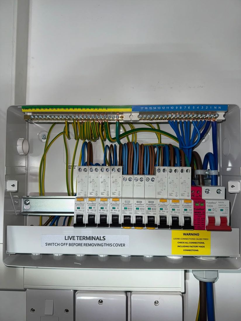 Open consumer unit showing new wiring