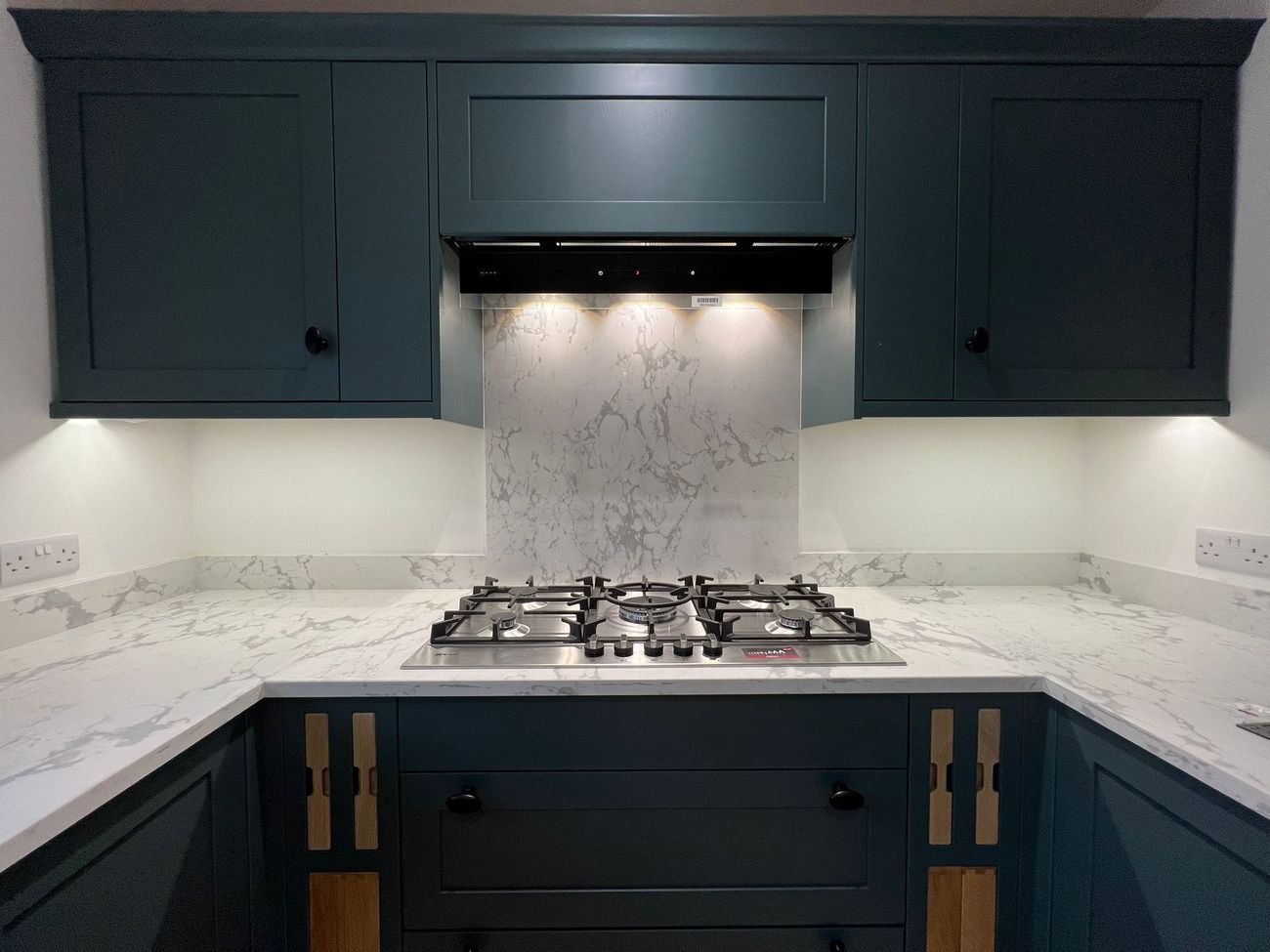 Kitchen hob, extractor and downlights installed
